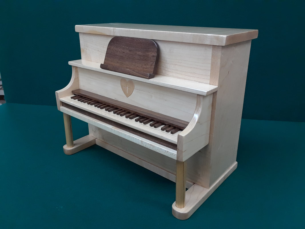 3D Hand Crafted Piano Urn
$550.00